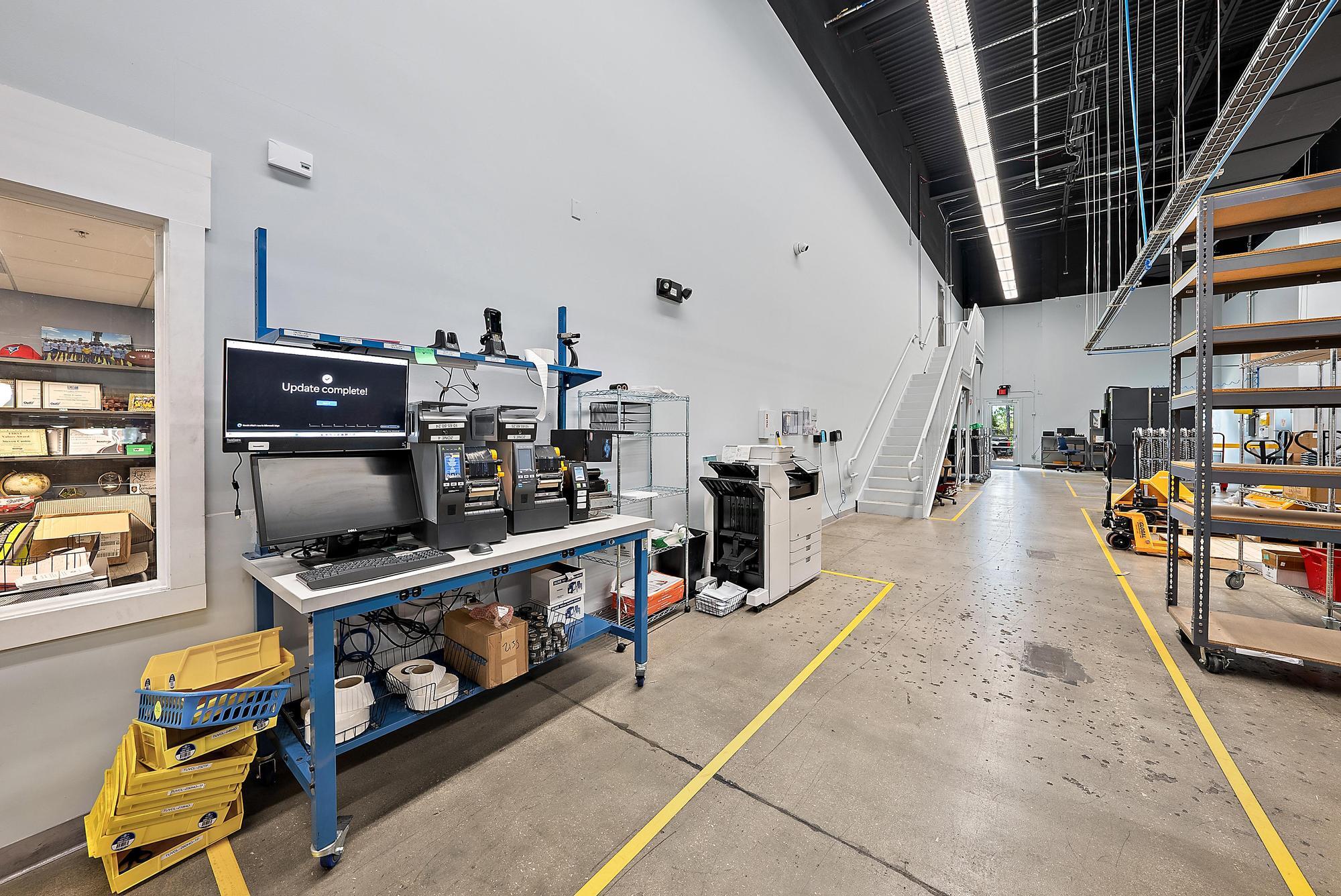 3126 Jupiter Park Drive Jupiter, FL 33458 - Photo 11 of 34 a room with lots of books and chairs