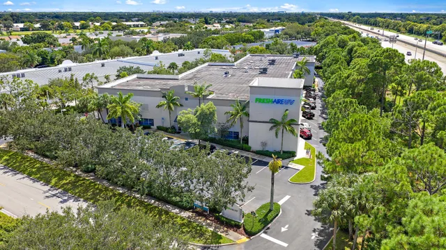 an aerial view of a house with a garden