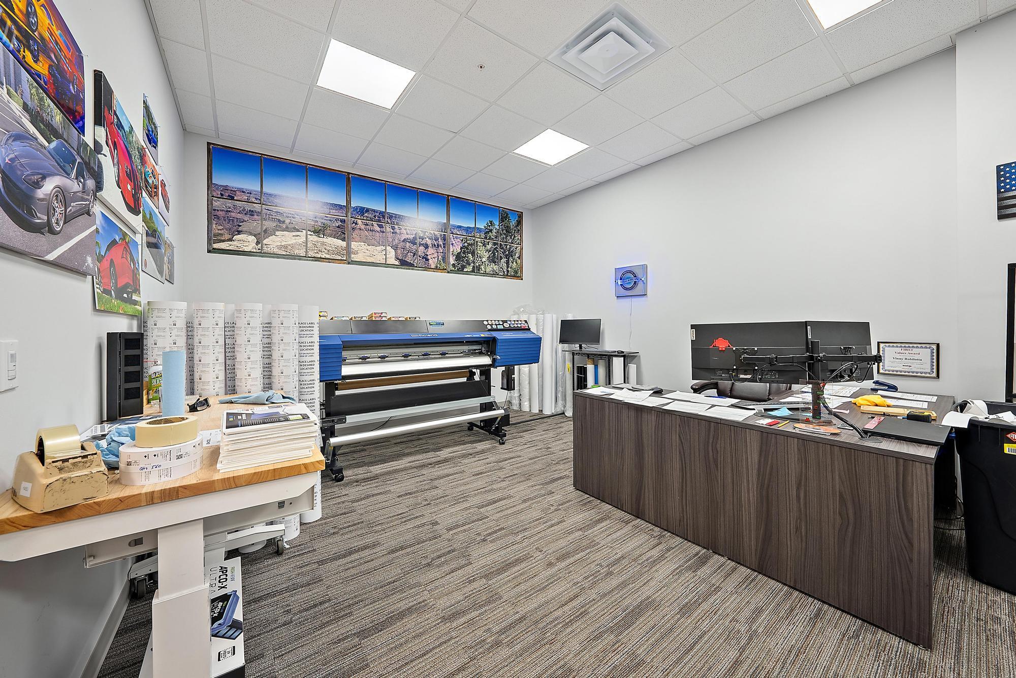 3126 Jupiter Park Drive Jupiter, FL 33458 - Photo 28 of 34 a view of a kitchen with furniture and wooden floor