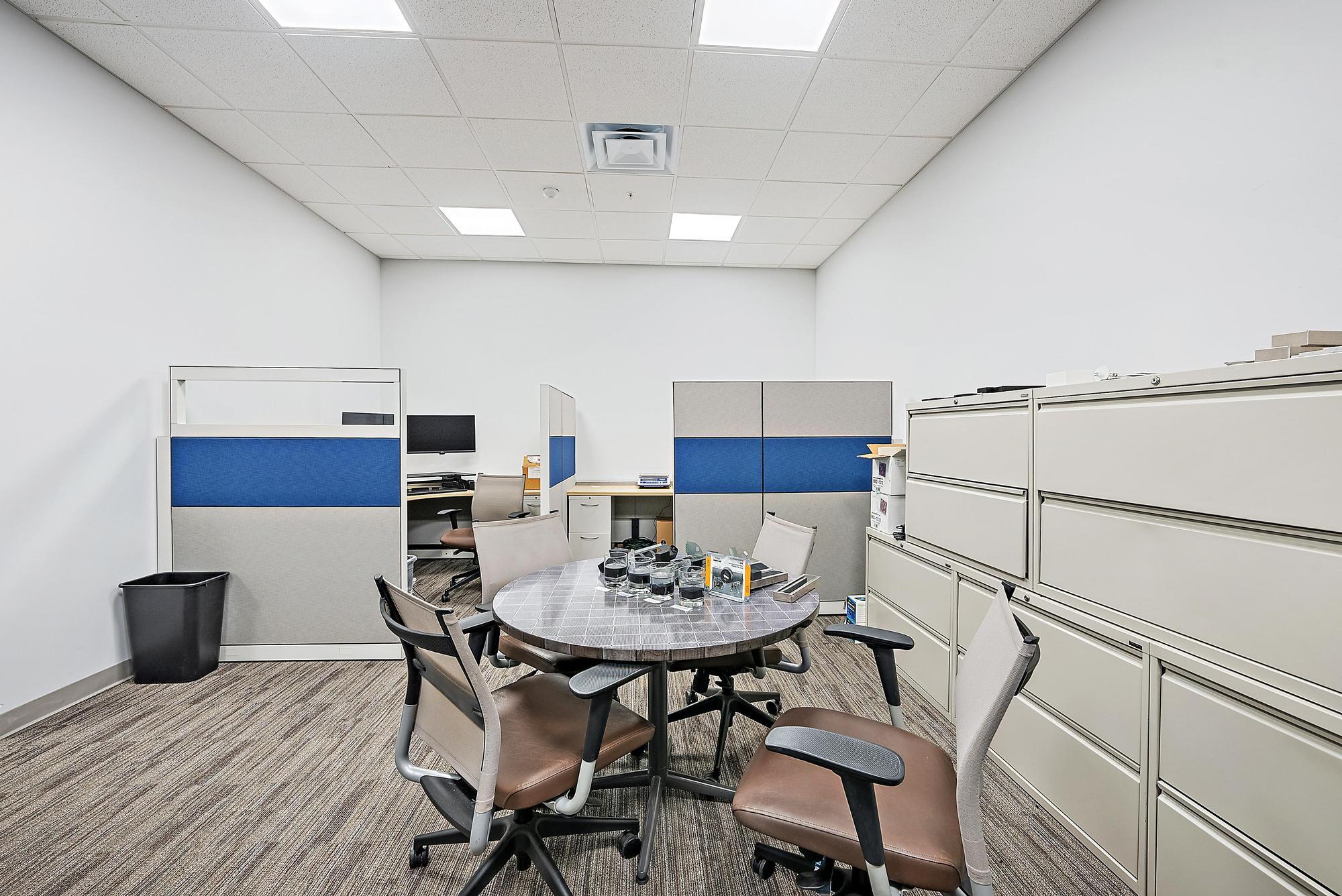 3126 Jupiter Park Drive Jupiter, FL 33458 - Photo 31 of 34 a view of a dining room with furniture and wooden floor
