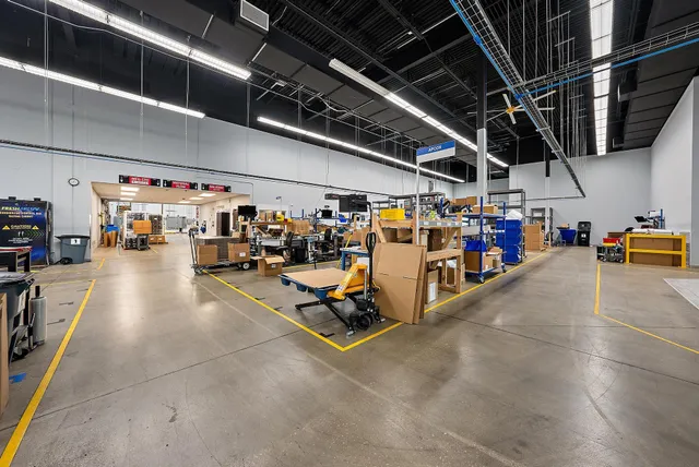 a view of parking garage with cars