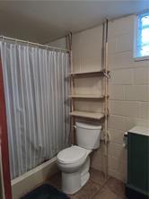 196 Valley Road Eighty Four, PA 15330 - Photo 16 of 23 a white toilet sitting next to a shower curtain