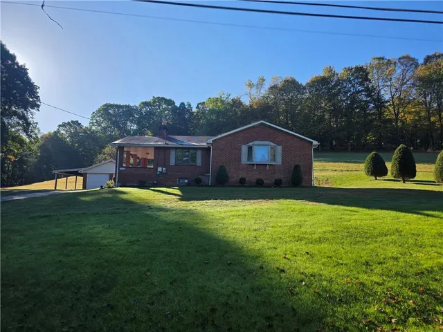 a house view with a garden space
