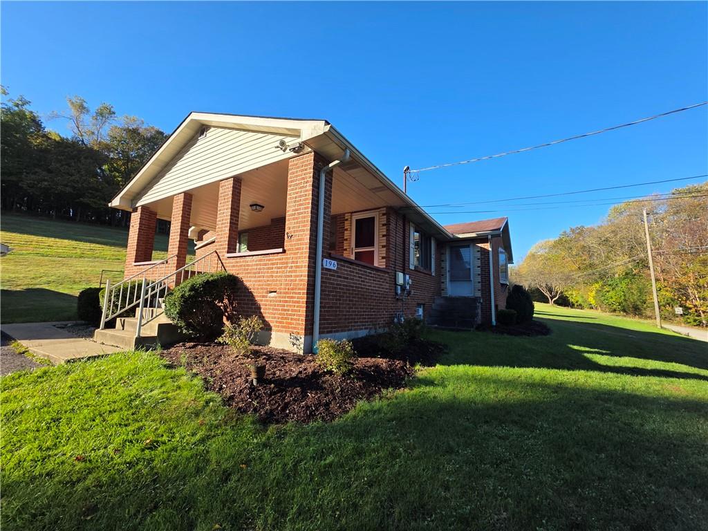196 Valley Road Eighty Four, PA 15330 - Photo 3 of 23 a view of a house with a yard