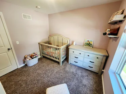 a room with toys and stairs