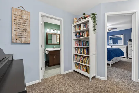 a view of an empty room with shelves