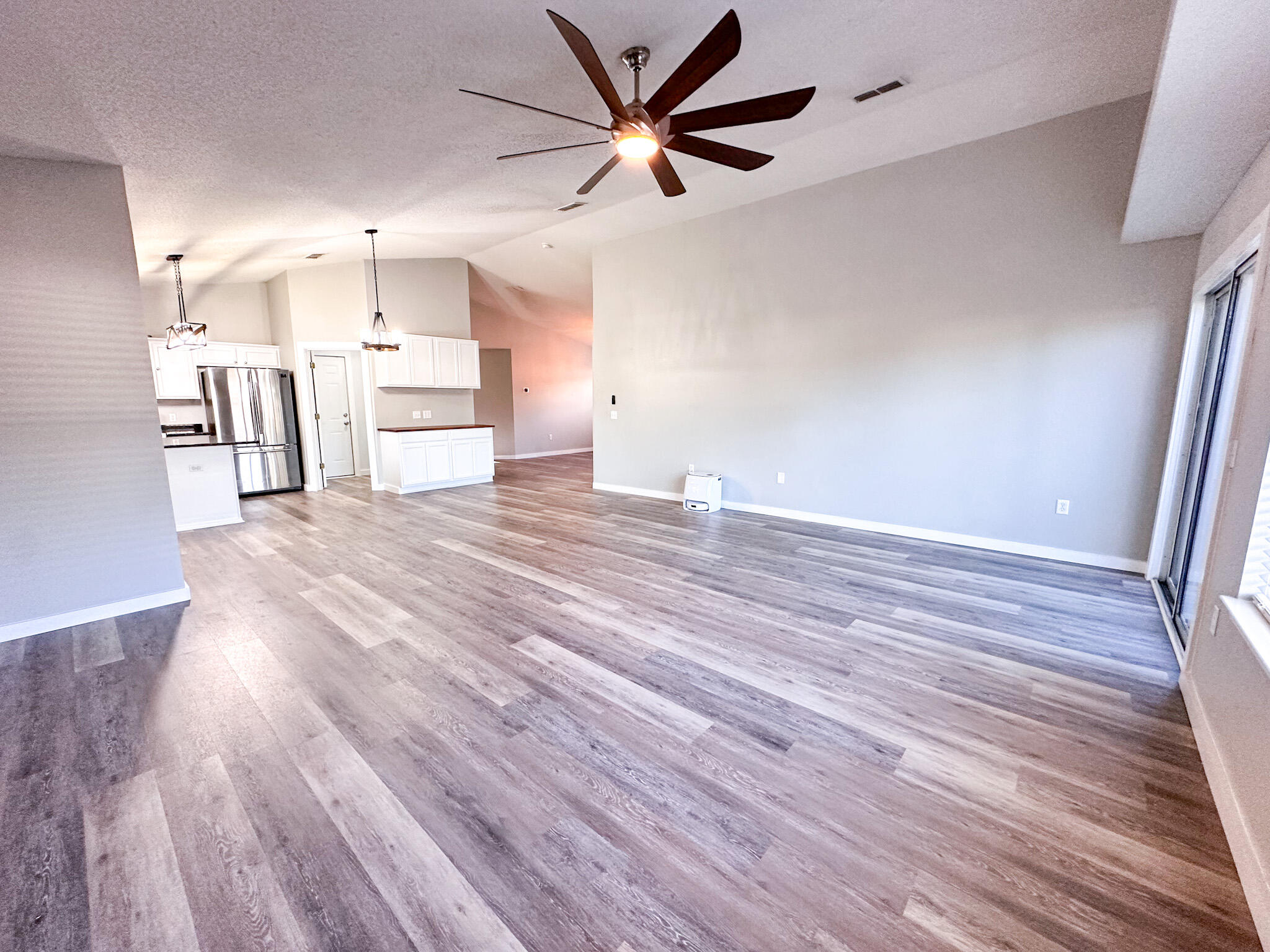 269 Limestone Circle Crestview, FL 32539 - Photo 13 of 32 a view of kitchen with wooden floor and window