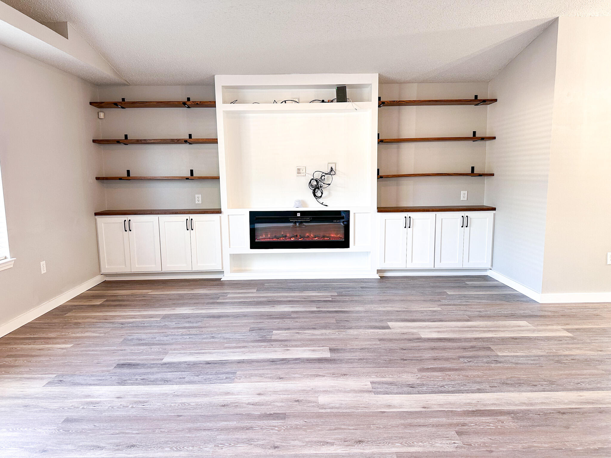 269 Limestone Circle Crestview, FL 32539 - Photo 6 of 32 a view of kitchen cabinets and wooden floor