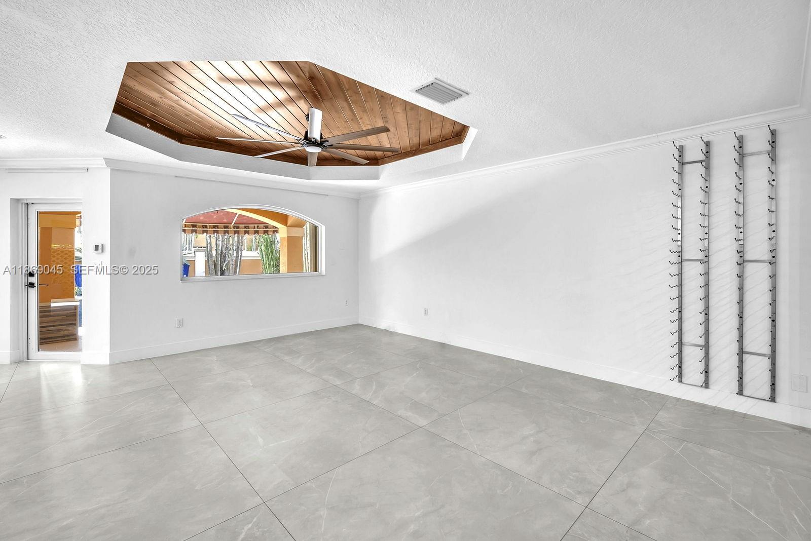 15244 Southwest 29th Terrace Miami, FL 33185 - Photo 22 of 74 a view of an empty room and wooden floor