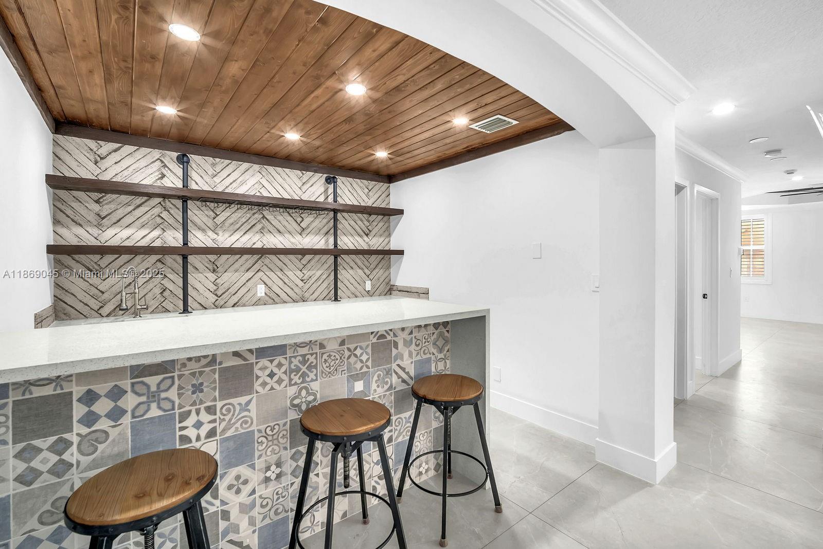 15244 Southwest 29th Terrace Miami, FL 33185 - Photo 24 of 74 a view of a chairs and table in a room