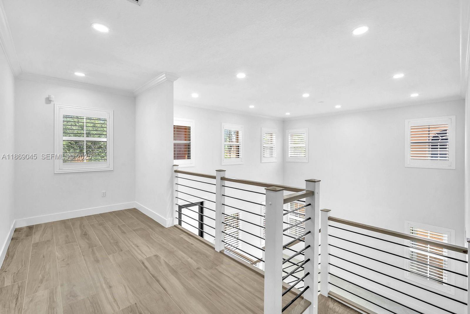 15244 Southwest 29th Terrace Miami, FL 33185 - Photo 29 of 74 a view of a room with wooden floor and window