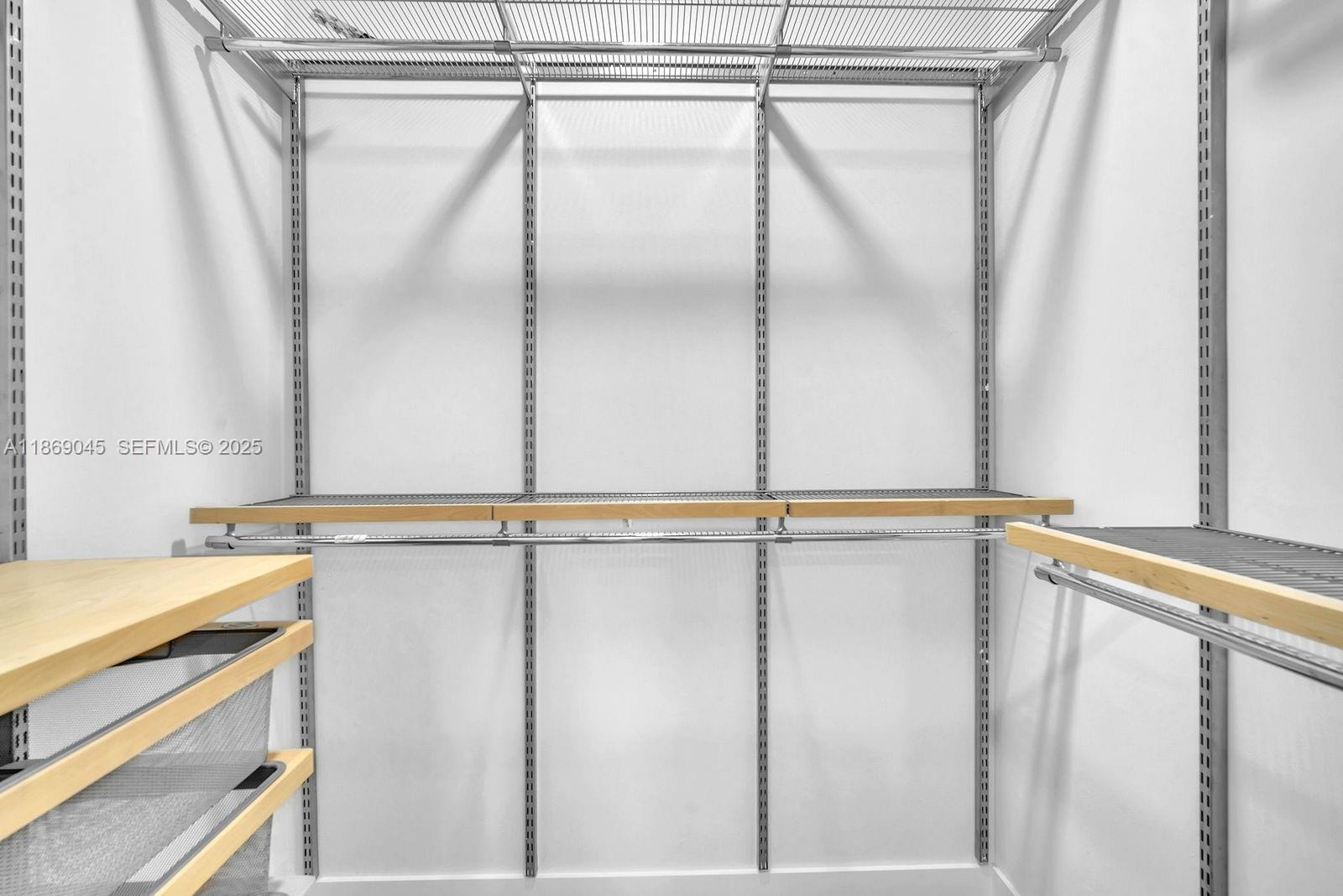 15244 Southwest 29th Terrace Miami, FL 33185 - Photo 42 of 74 a view of a room with racks on the wall