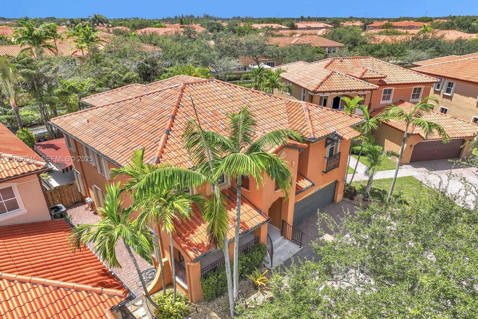 15244 Southwest 29th Terrace Miami, FL 33185 - Photo 6 of 74 an aerial view of a house with a yard