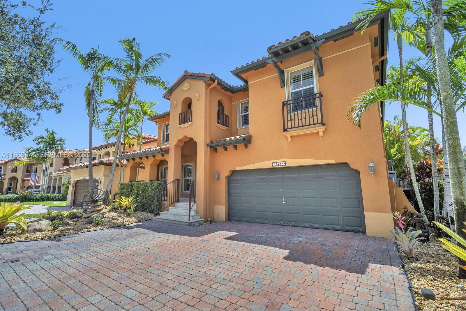 15244 Southwest 29th Terrace Miami, FL 33185 - Photo 8 of 74 a front view of a house with garden