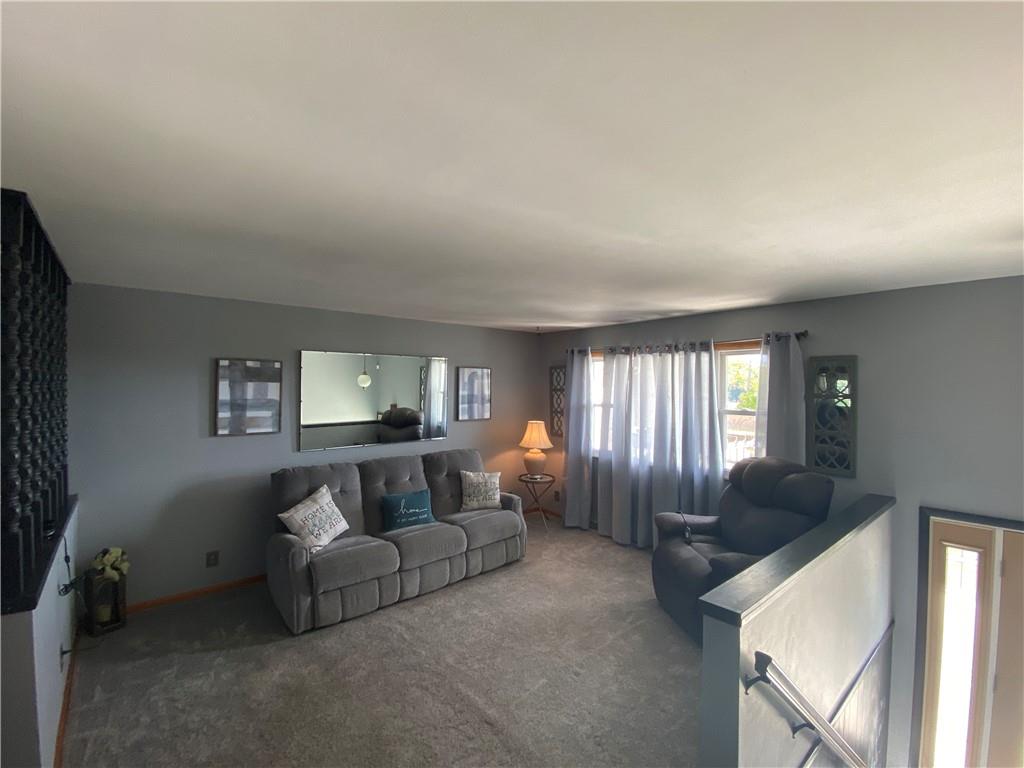 1009 Dutch Ridge Road Ellwood City, PA 16117 - Photo 2 of 12 a living room with furniture and a window