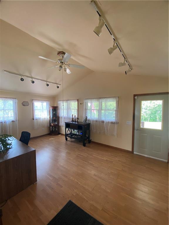 1009 Dutch Ridge Road Ellwood City, PA 16117 - Photo 9 of 12 a view of a livingroom with furniture and a ceiling fan
