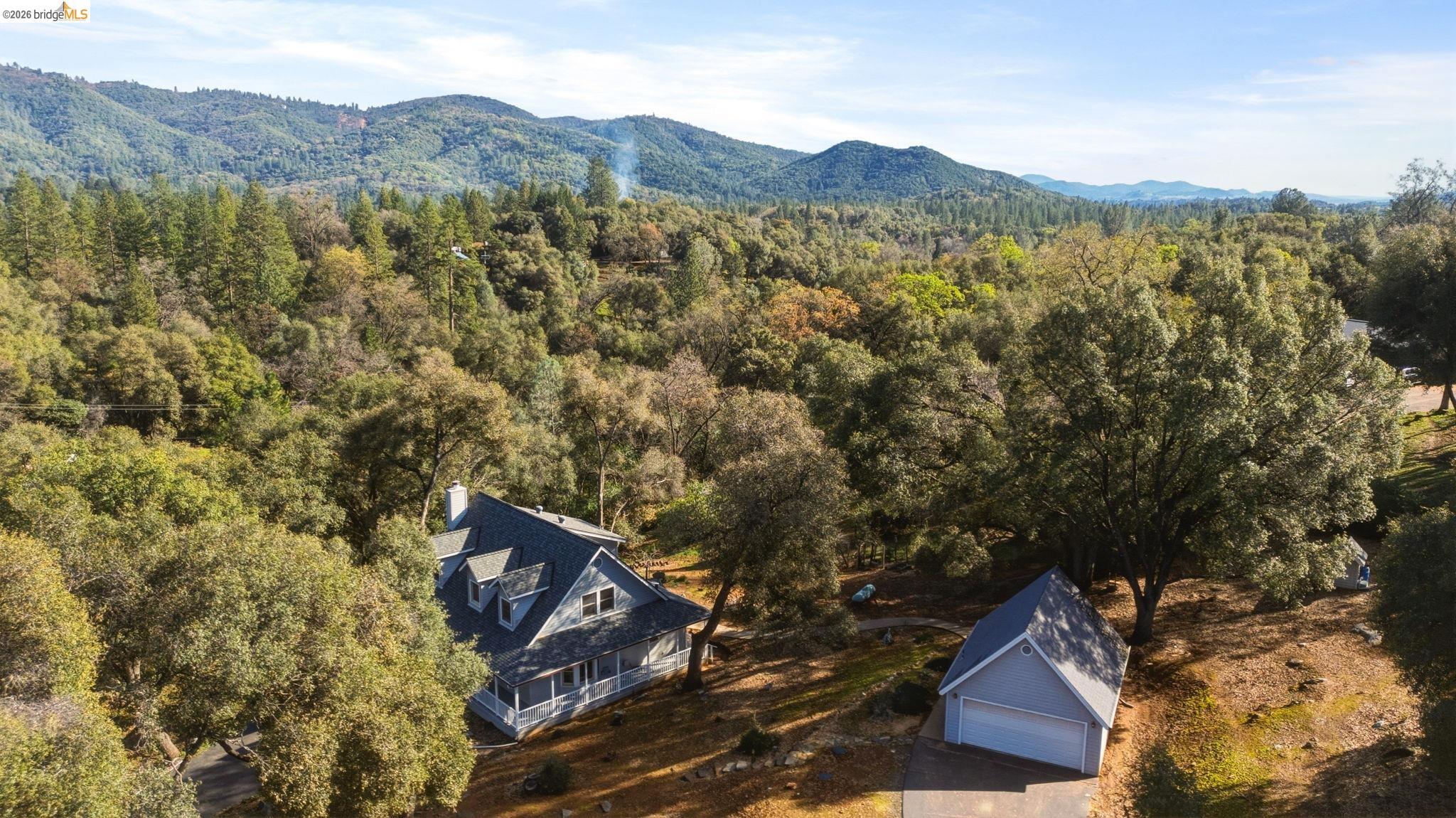 23401 Italian Bar Road Columbia, CA 95310 - Photo 22 of 49 a view of a mountain with a forest