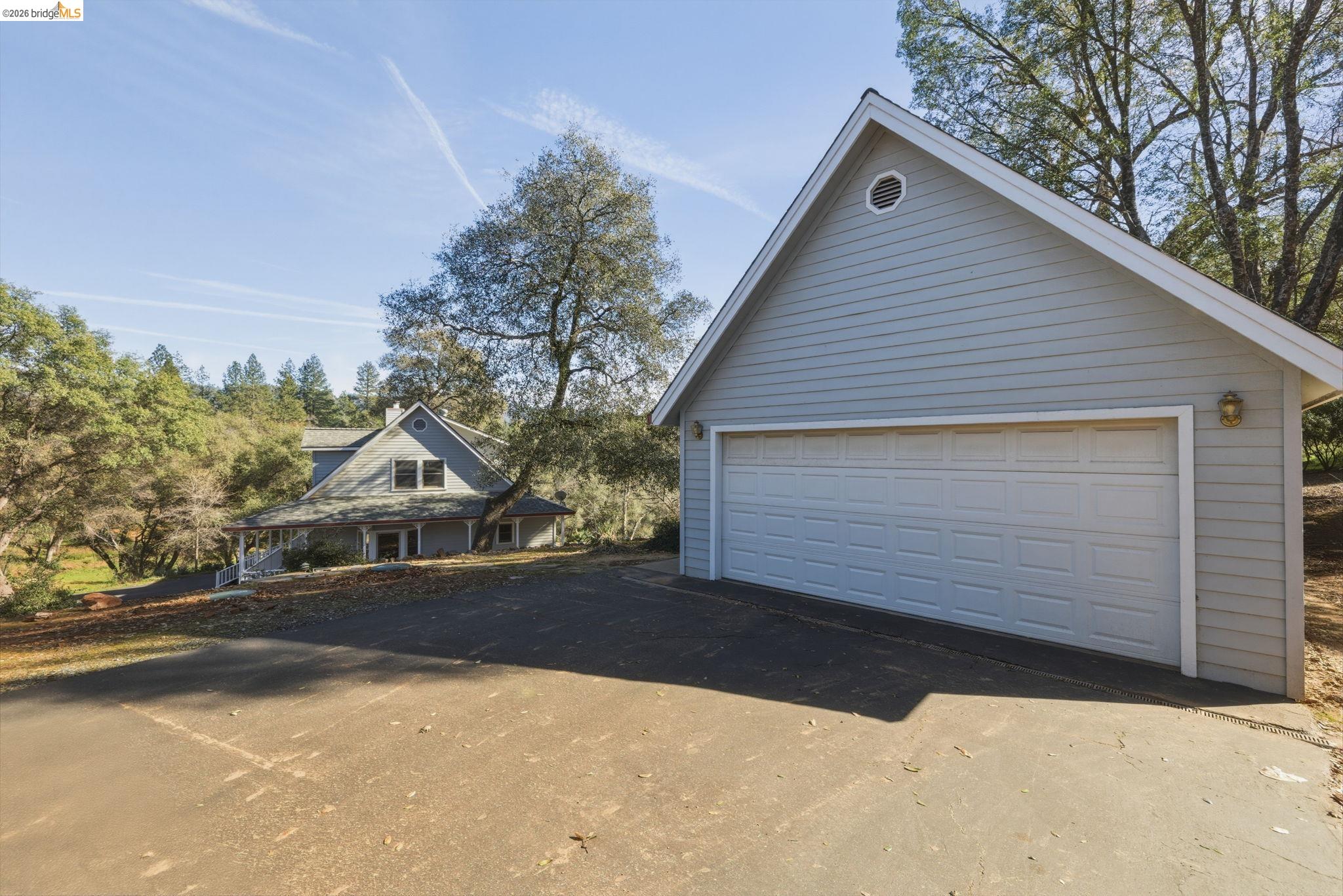 23401 Italian Bar Road Columbia, CA 95310 - Photo 43 of 49 a view of a house with a yard