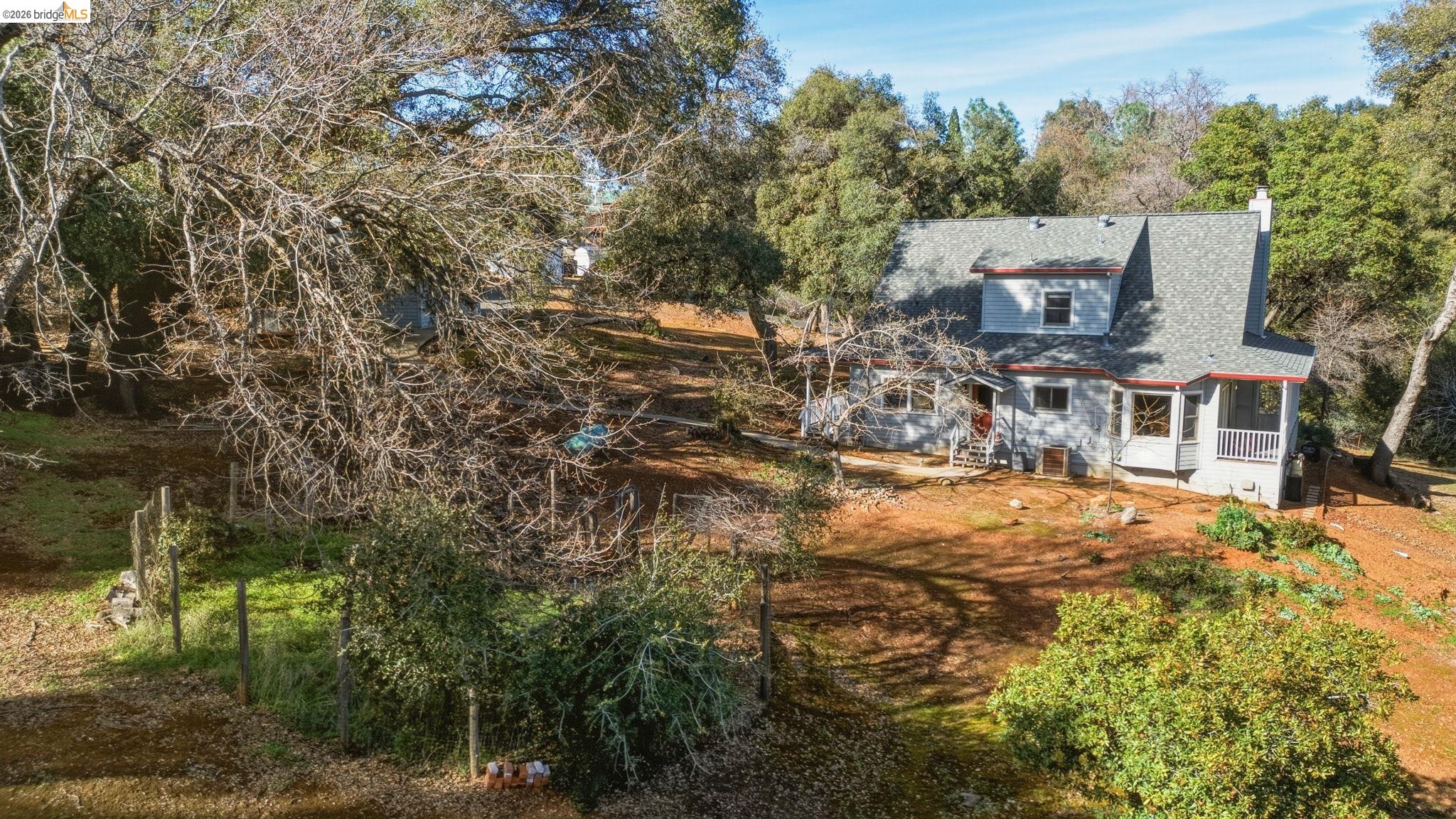 23401 Italian Bar Road Columbia, CA 95310 - Photo 44 of 49 a view of a house with a yard