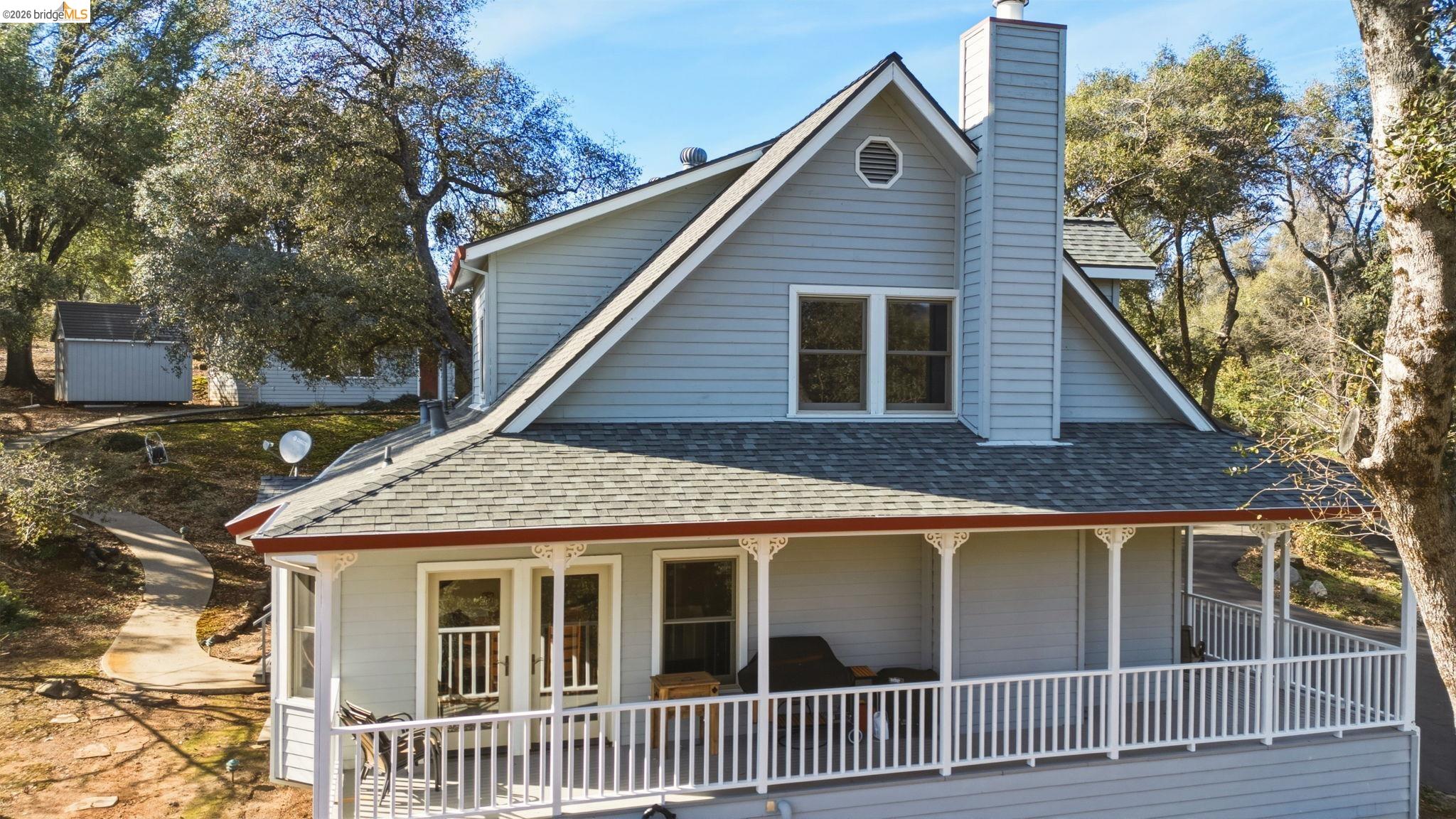 23401 Italian Bar Road Columbia, CA 95310 - Photo 45 of 49 a front view of a house with a yard
