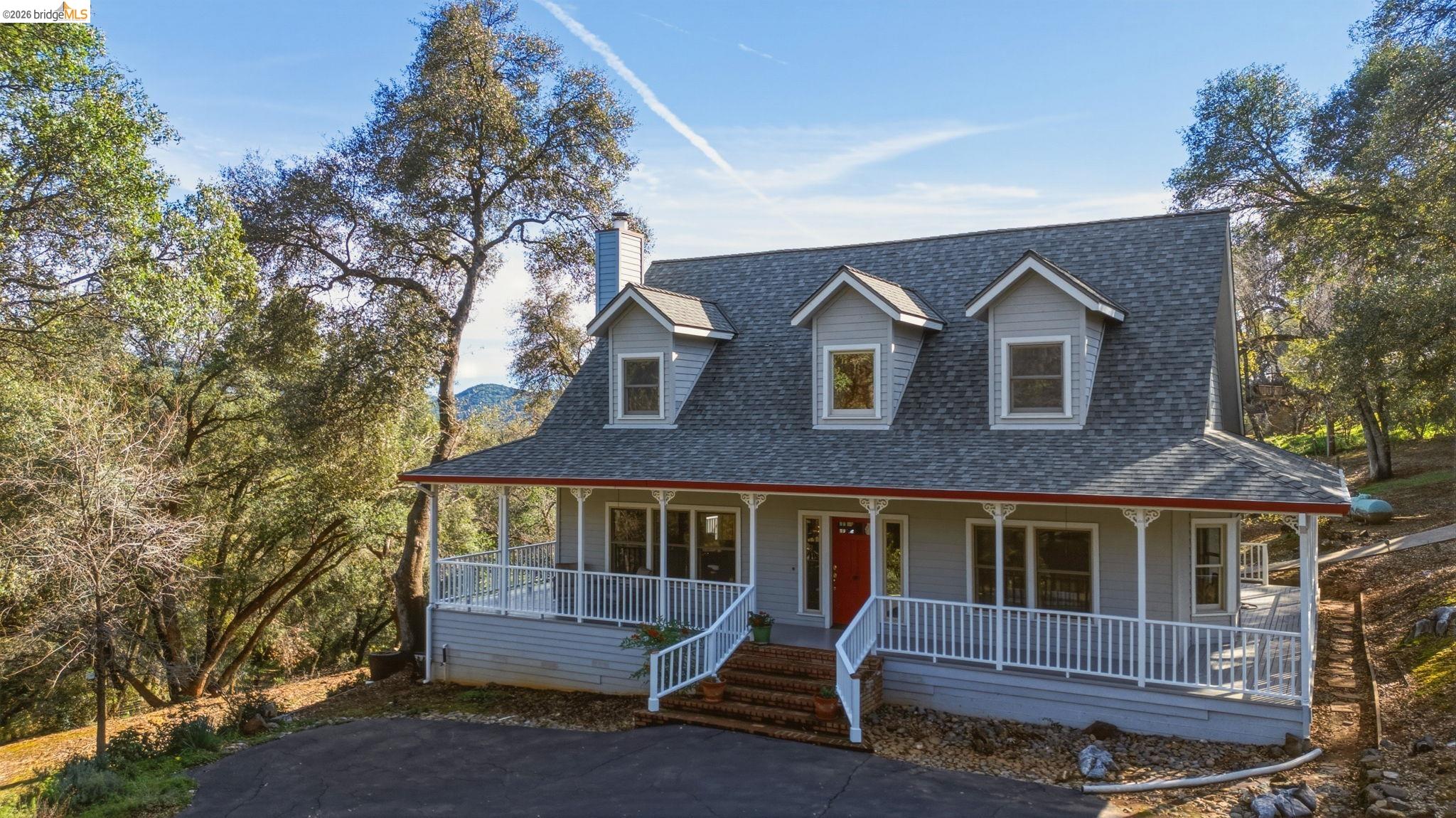 23401 Italian Bar Road Columbia, CA 95310 - Photo 46 of 49 a front view of a house with a yard