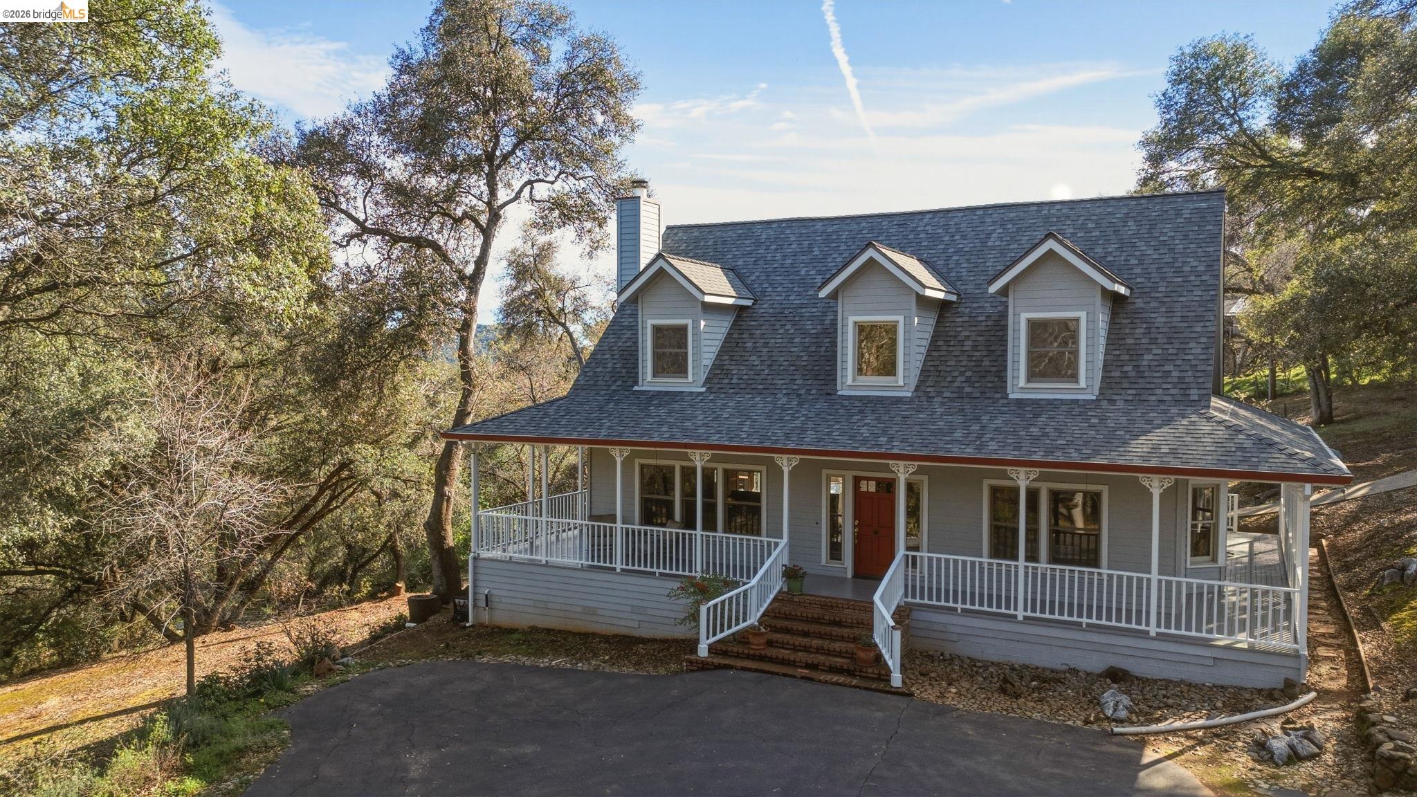 23401 Italian Bar Road Columbia, CA 95310 - Photo 47 of 49 a front view of a house with a yard
