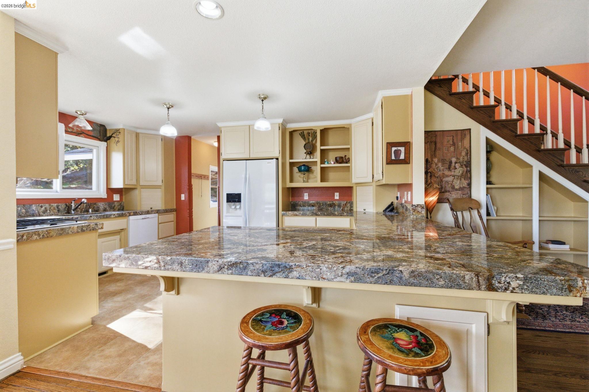 23401 Italian Bar Road Columbia, CA 95310 - Photo 48 of 49 a kitchen with stainless steel appliances granite countertop a sink and cabinets