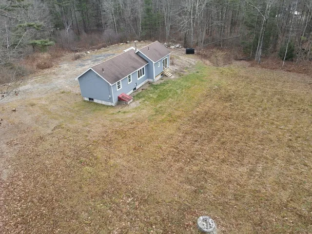 a view of a yard with a barn