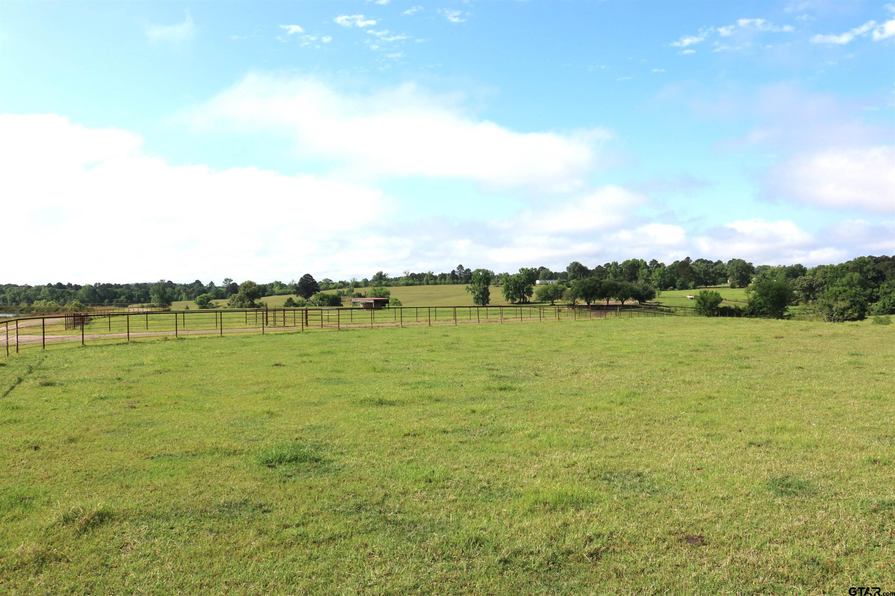 2 State Highway Ore City, TX 75683 - Photo 16 of 22 a view of a lake with houses in the back