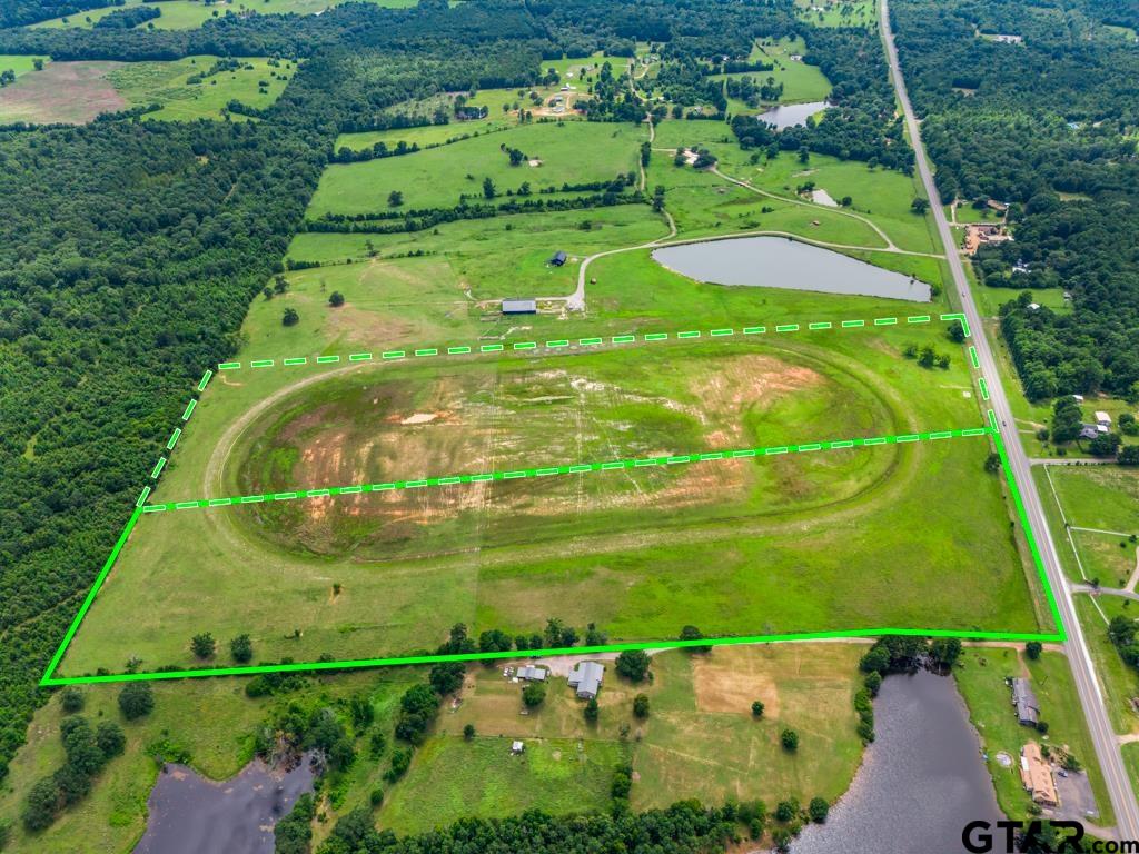 2 State Highway Ore City, TX 75683 - Photo 21 of 22 an aerial view of a golf course with a garden