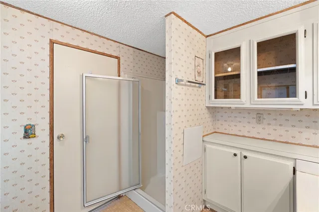 a view of a house with a tree