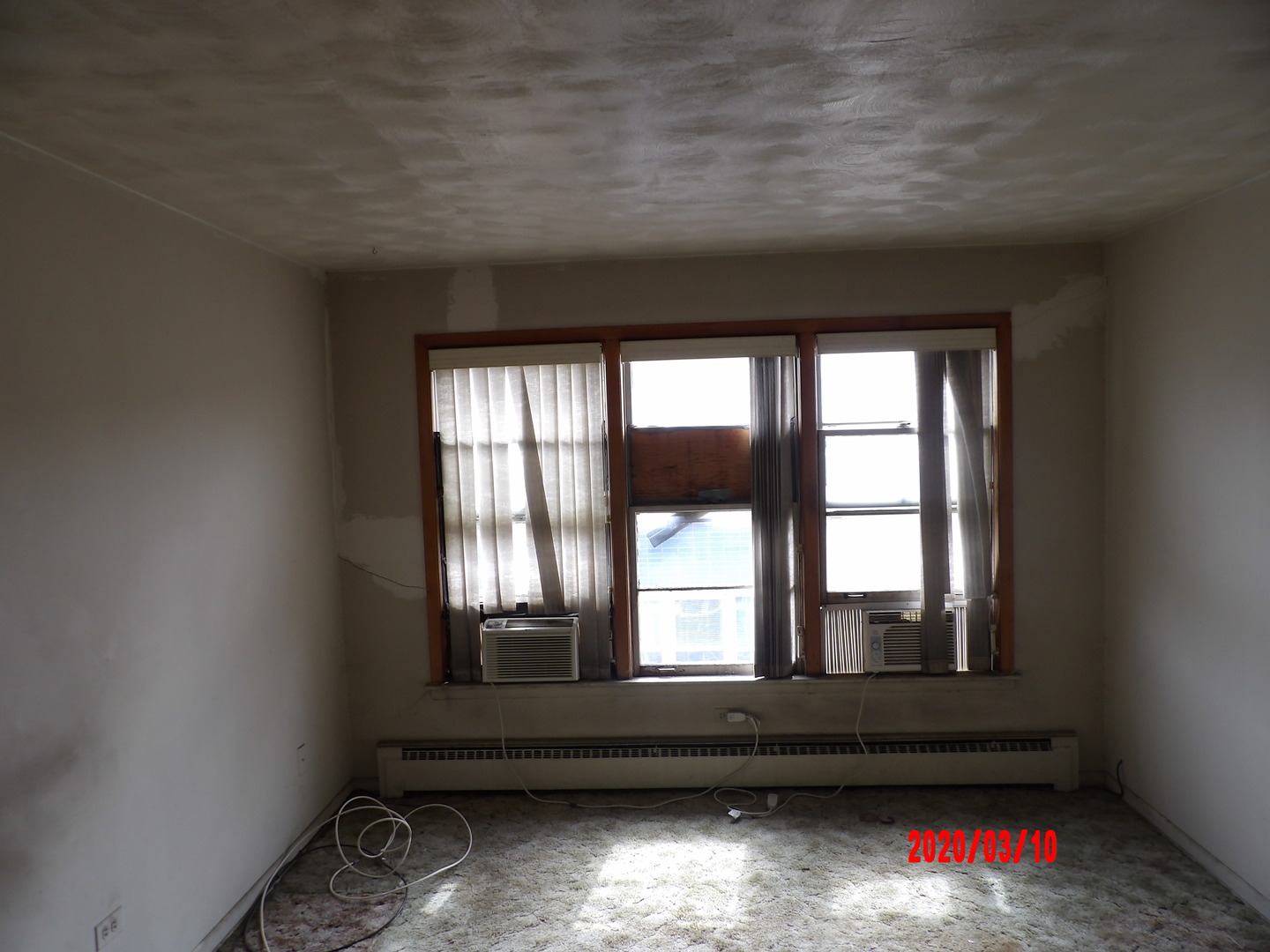 9211 South Cottage Grove Avenue, Unit 9C2 Chicago, IL 60619 - Photo 5 of 6 wooden floor and window in a room