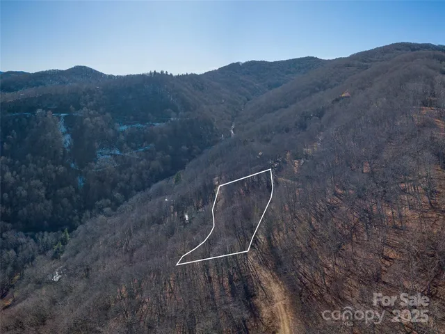 a view of a house with mountain view