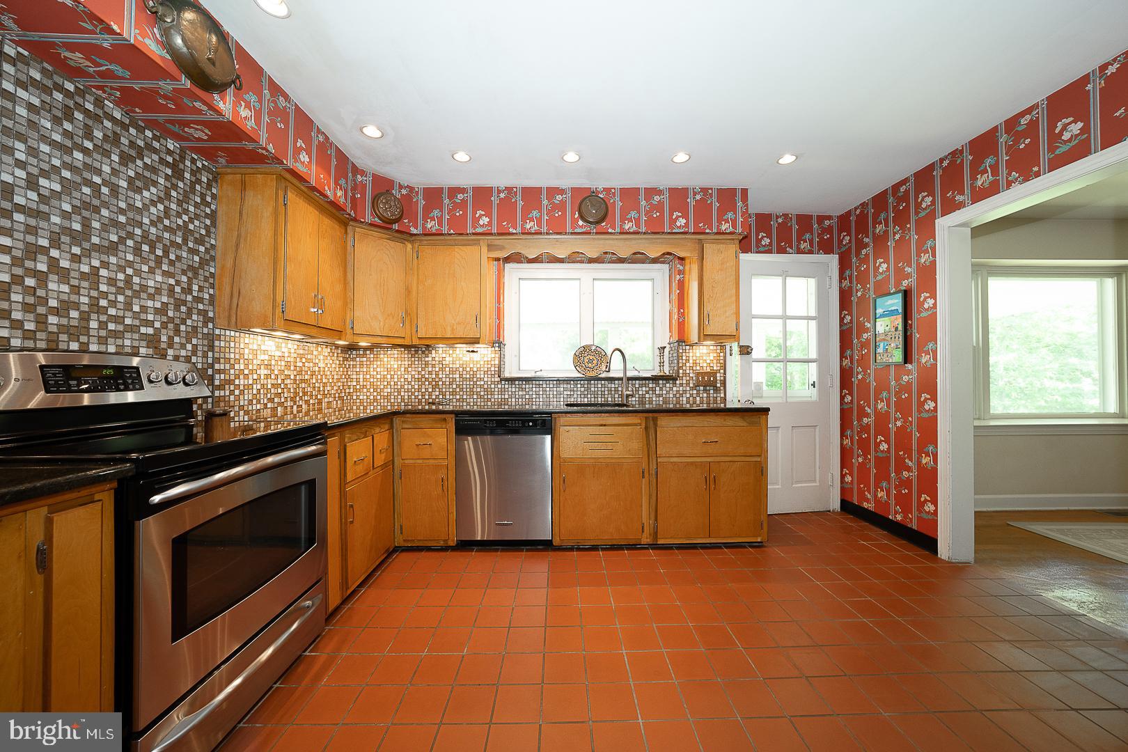 1125 Hillcrest Road Penn Valley, PA 19072 - Photo 12 of 38 Kitchen with Exit to Rear Patio