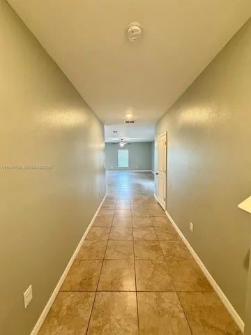 a bathroom with a shower and a mirror