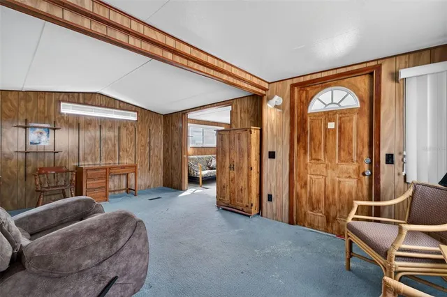 a view of a room with furniture