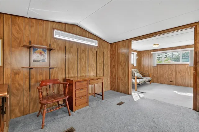 a view of livingroom with furniture and windows