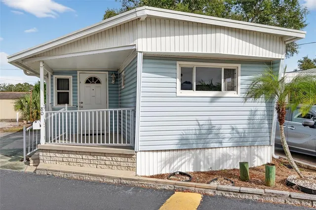 a front view of a house with a garage