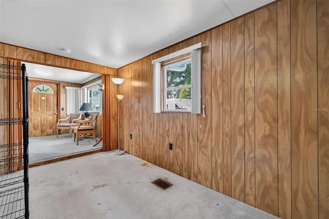 a bathroom with a sink vanity granite and a mirror