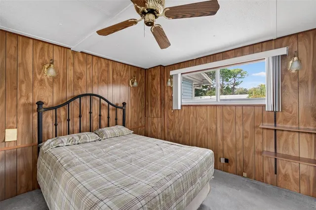 a kitchen with stainless steel appliances granite countertop white cabinets stove a sink and dishwasher