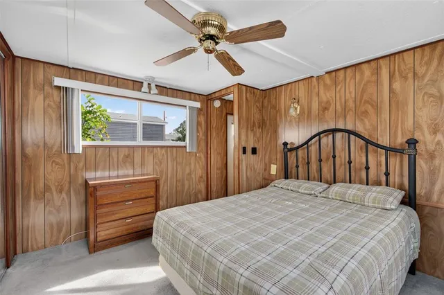 a kitchen with stainless steel appliances granite countertop a refrigerator a stove top oven a sink and dishwasher