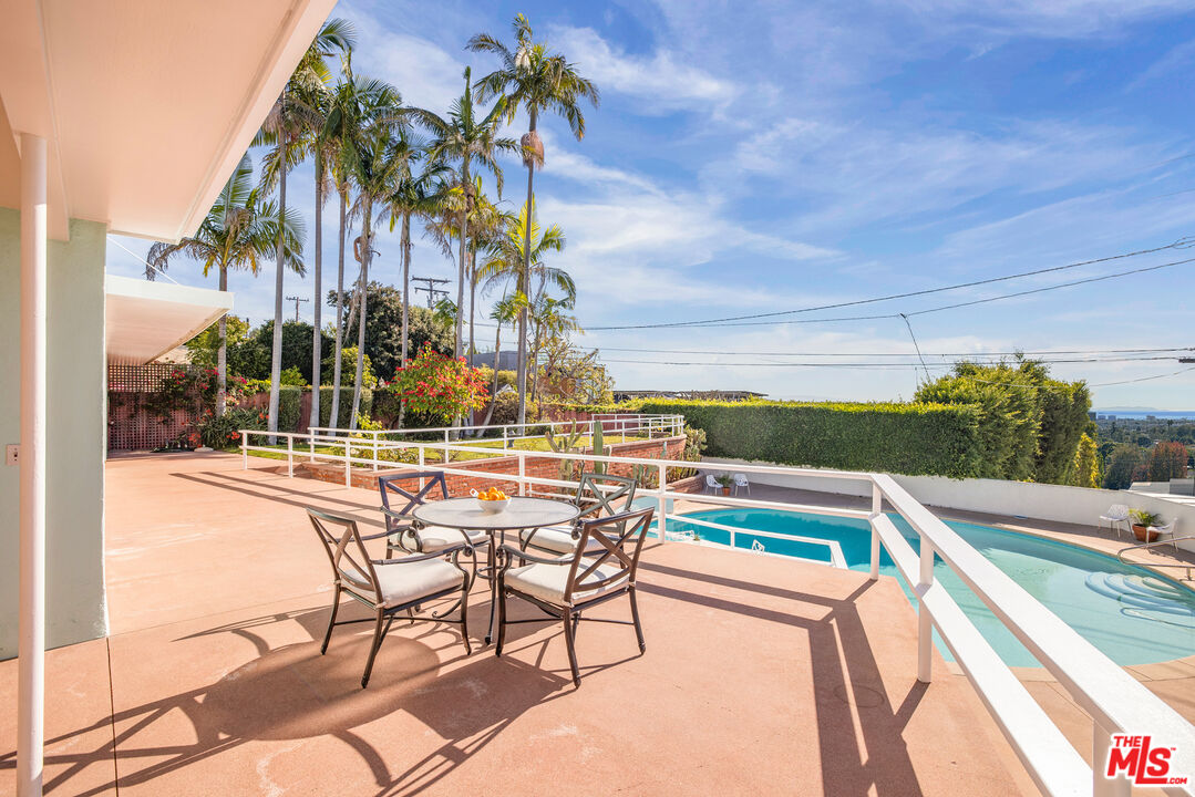 810 Franklin Street Santa Monica, CA 90403 - Photo 2 of 49 a view of swimming pool with outdoor seating and city view