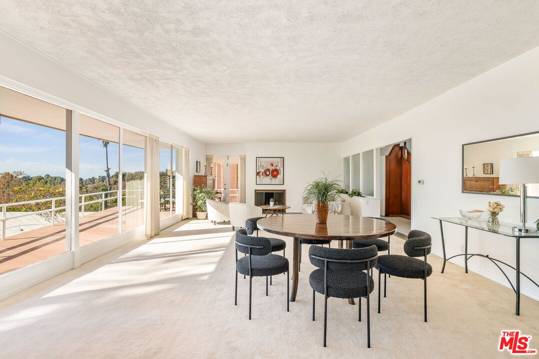 810 Franklin Street Santa Monica, CA 90403 - Photo 10 of 49 a dining room with furniture and large windows