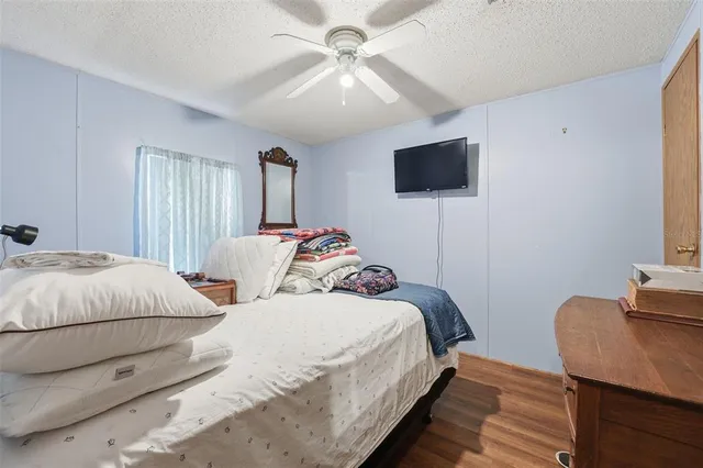 a room with furniture and wooden floor