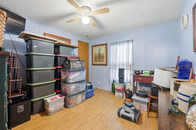 a bathroom with a sink a toilet and a shower