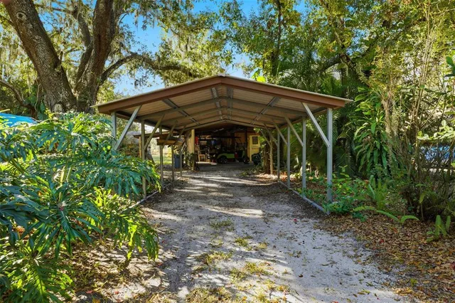 a view of a garage with a table and chairs