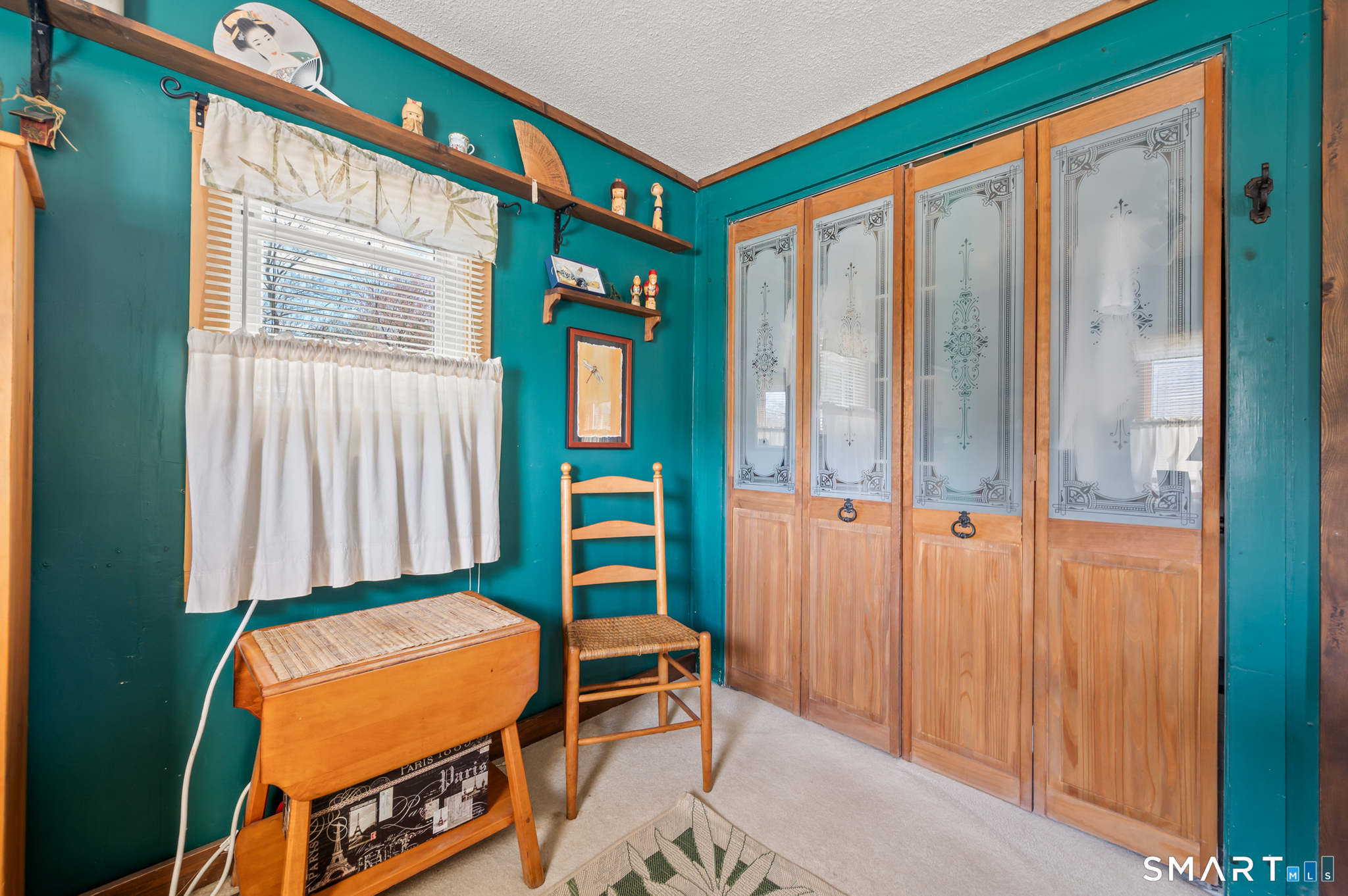 12 Booth Road Enfield, CT 06082 - Photo 13 of 30 a room with furniture and a window