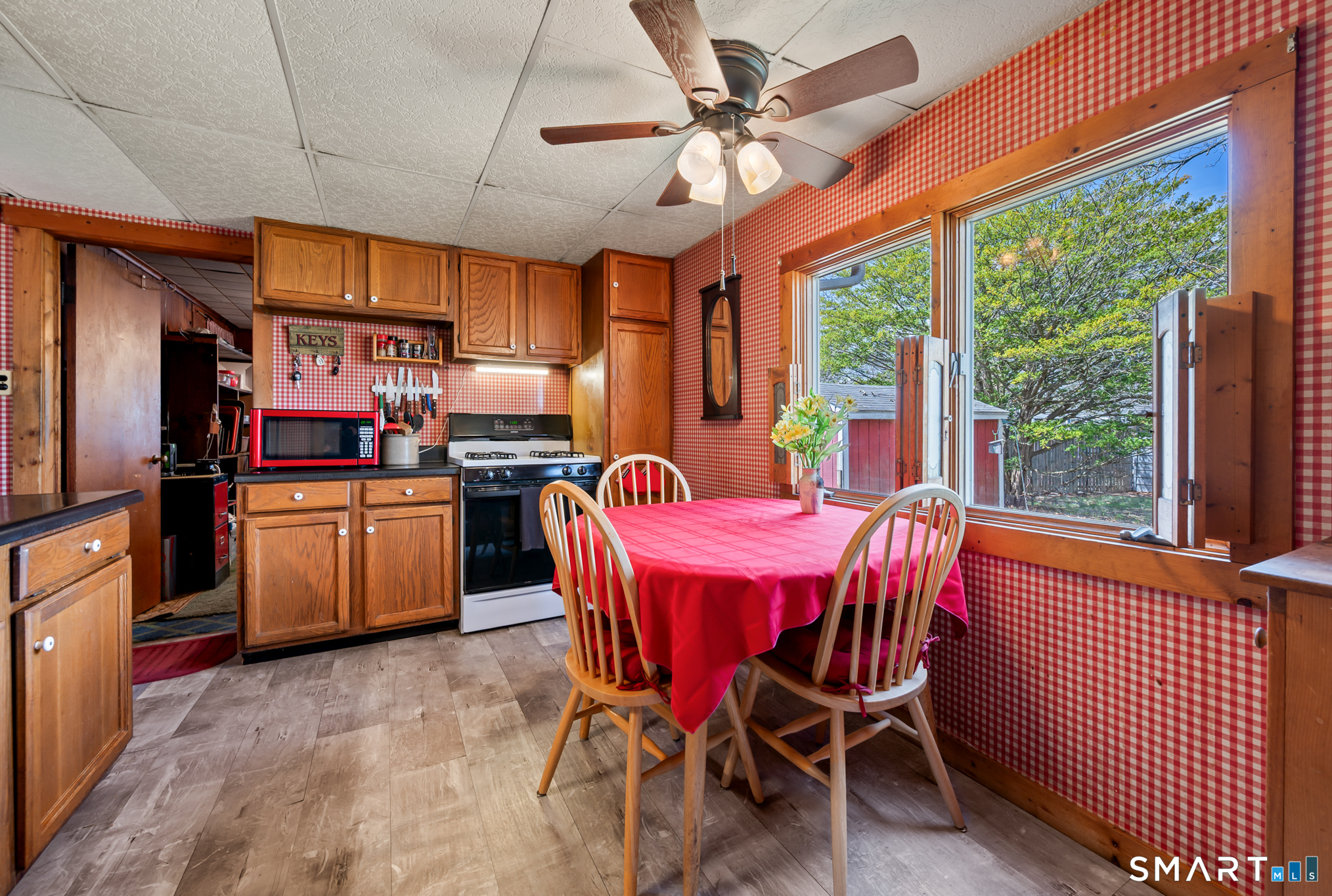 12 Booth Road Enfield, CT 06082 - Photo 20 of 30 a view of a dining room with furniture window and outside view
