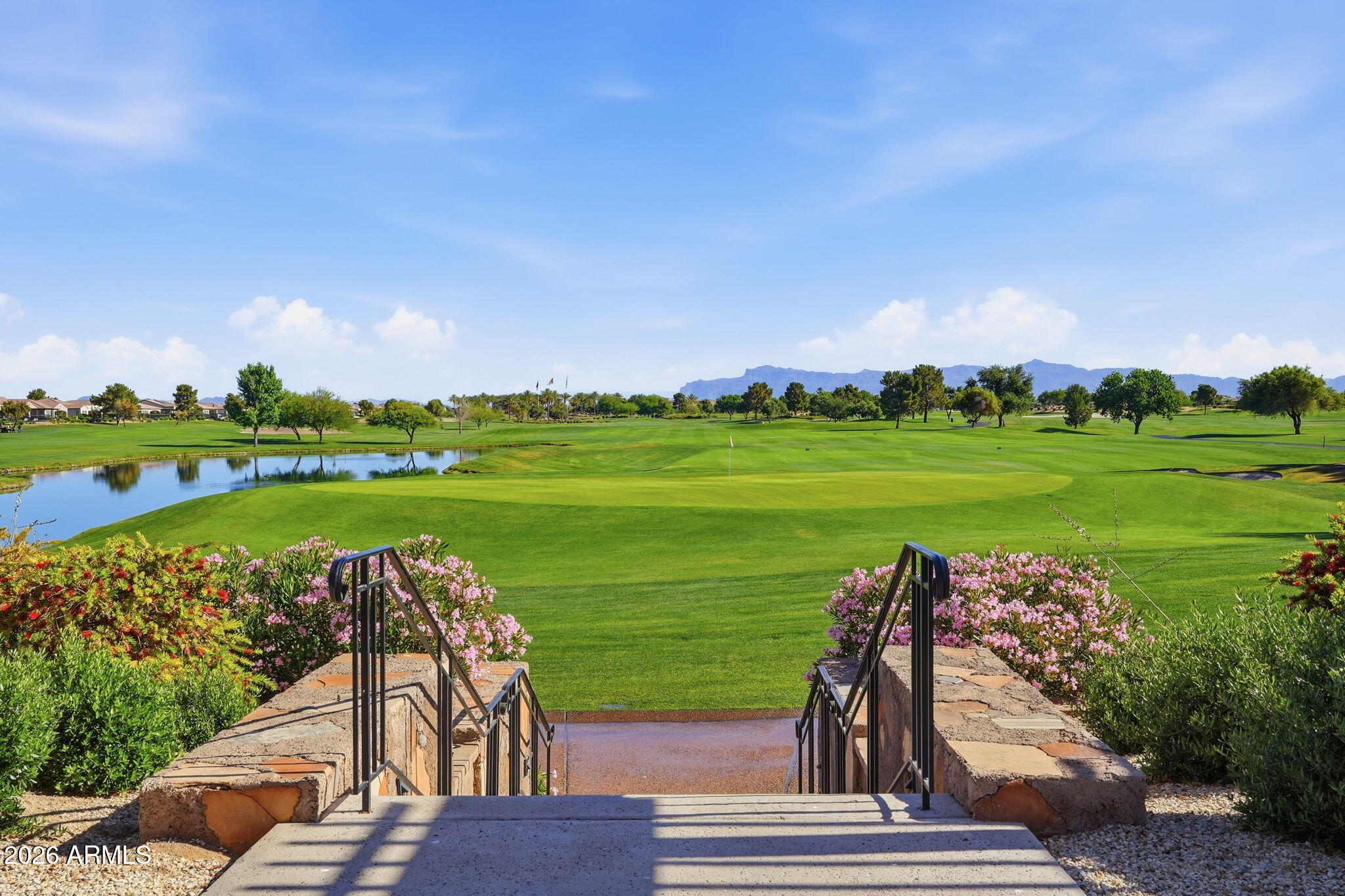 1694 East Grand Ridge Road Queen Creek, AZ 85140 - Photo 61 of 61 a view of a golf course with a lake