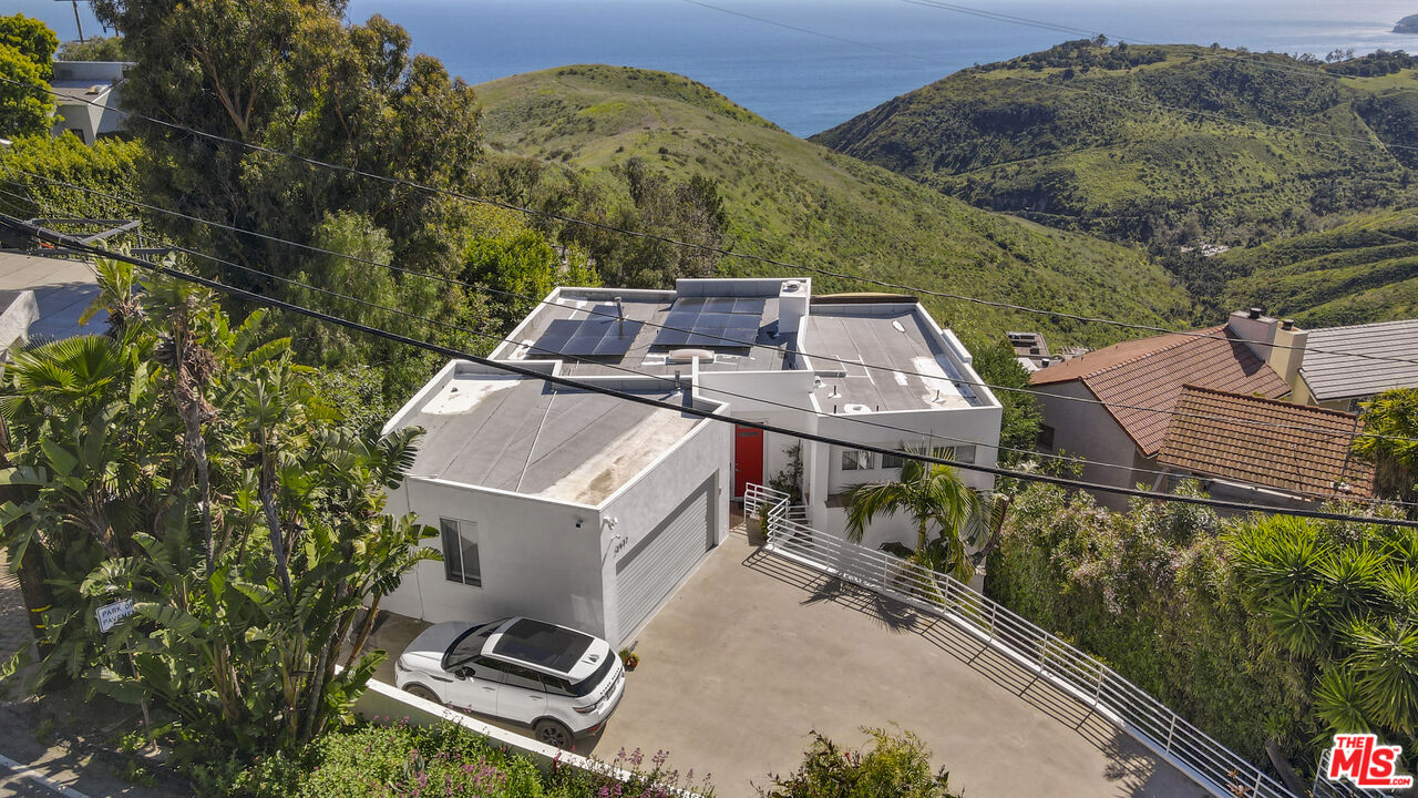 2977 Seabreeze Drive Malibu, CA 90265 - Photo 2 of 48 an aerial view of a house with a garden